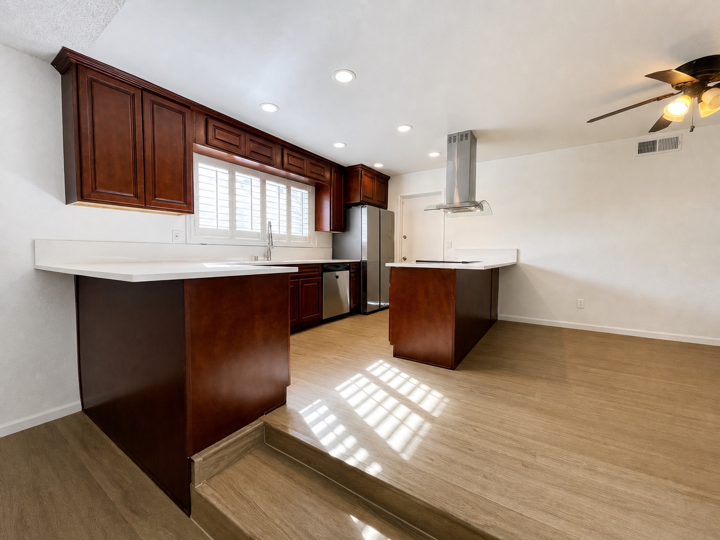 Remodeled chef's kitchen with island and premium finishes